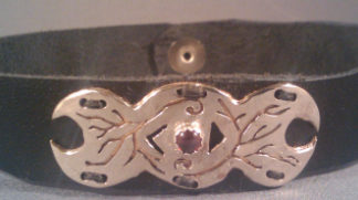 Sterling silver overlay triple moon on leather choker with bezel set carnelian. c.2008
