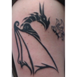 Christof designed this tattoo to represent the power of fantasy with the beauty of nature. Dragon & Butterfly Tattoo